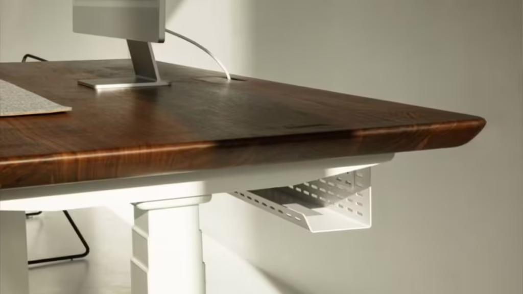 cable-holders-tray-desk Cable holders desk with tray for complete organization.