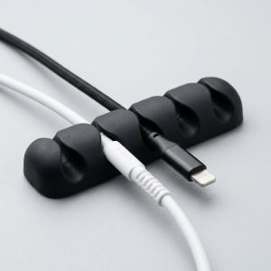 Cable Holder Clips for Cord Management: Black adhesive silicone clips routing thin cables seamlessly